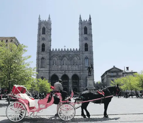  ?? PHOTOS: ALLEN MCINNIS / POSTMEDIA NEWS ?? Montreal Mayor Denis Coderre said Wednesday the city will examine the horse-drawn carriage issue, saying the horses’ health is paramount.