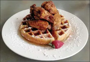  ?? Democrat-Gazette file photo ?? You can no longer get this Ceci’s Chicken and Belgian Waffle in North Little Rock, but you can find it on Dave Ward Drive in Conway.