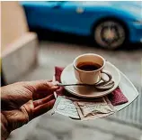  ??  ?? Two time-proven ways to start the day: doppio espresso and a fang in your Ferrari. One more affordable than the other...