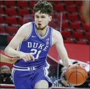  ?? ETHAN HYMAN — THE ASSOCIATED PRESS ?? Duke’s Matthew Hurt drives during Saturday’s win over North Carolina State. At 8-8, the Blue Devils could miss the NCAA Tournament for the first time in 26years.