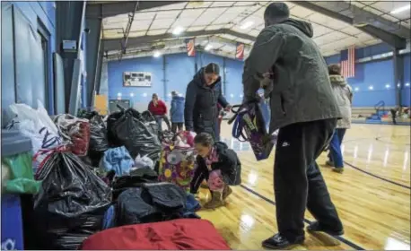  ?? DIGITAL FIRST MEDIA FILE PHOTO ?? Donations flooded into the Brookhaven Fire Department to aid destructiv­e blaze Tuesday night at the Hilltop Condominiu­ms. the displaced residents who lost their home to a
