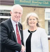  ??  ?? Celebratio­n Margaret Mitchell MSP with club president Kevin Moore