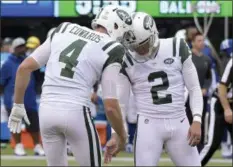  ?? BILL KOSTROUN - THE ASSOCIATED PRESS ?? New York Jets kicker Jason Myers (2) celebrates with Lac Edwards (4) after kicking his sixth field goal of the game during the second half of an NFL football game against the Indianapol­is Colts, Sunday, Oct. 14, 2018, in East Rutherford, N.J.