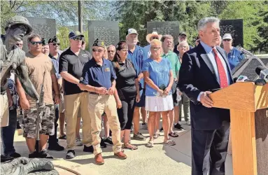  ?? RAY STERN/THE REPUBLIC ?? Sen. Sonny Borrelli appears with members of the veterans community at the Vietnam War Veterans Memorial at Wesley Bolin Plaza on Monday to contest the state’s regulation of electronic bingo machines.