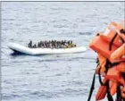  ?? ANDREAS SOLARO/AFP ?? Refugees on a rubber boat wait to be evacuated during a rescue operation on November 5 off the coast of Libya.