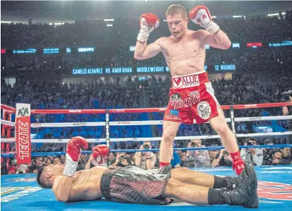  ?? USA TODAY SPORTS ?? Canelo Alvarez knocks out Amir Khan in the sixth round of their middleweig­ht title fight.