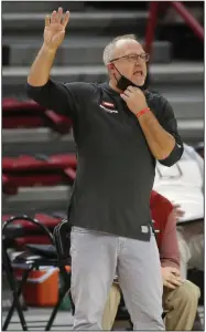  ?? (NWA Democrat-Gazette/David Gottschalk) ?? Arkansas Coach Mike Neighbors has led the Razorbacks to victories in two of the past three games against Florida, their opponent tonight. They previously had lost 8 of 9 to the Gators.