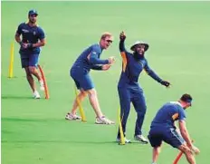  ?? AFP ?? Finishing touches South Africa’s captain Hashim Amla (second from right) gestures during a training session in New Delhi yesterday.