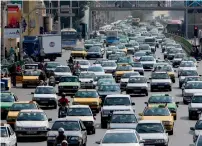  ?? AFP ?? Iranians driving in heavy traffic in the capital Tehran. —