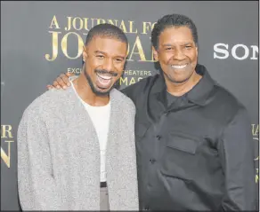  ?? Andy Kropa The Associated Press ?? Actor Michael B. Jordan, left, and director Denzel Washington attend the world premiere of “A Journal for Jordan” Dec. 9 in New York.