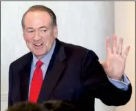  ?? Arkansas Democrat-Gazette/MELISSA SUE GERRITS ?? Mike Huckabee, the former Arkansas governor and 2016 Republican presidenti­al candidate, waves goodbye to reporters Wednesday afternoon after a Little Rock press conference. Huckabee was in town for a fundraiser.