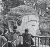  ?? PROVIDED TO CHINA DAILY ?? From left: The Giant Buddha in Leshan, Sichuan province, reopens on March 23. ZHANG CHAOQUN / XINHUA A rose garden attracts visitors to Jiujiang, Jiangxi province, on Sunday. WEI DONGSHENG / FOR CHINA DAILY Beijing WTown, a tourist attraction modeled on a water town, is back in business. PROVIDED TO CHINA DAILY Wuzhen, a water town in Zhejiang province, reopens on April 15.