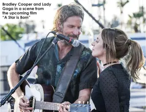  ??  ?? Bradley Cooper and Lady Gaga in a scene from the upcoming film
“A Star is Born”