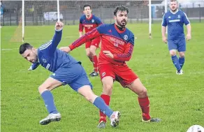  ??  ?? Douglas Athletic (red) beat St James 2-1 after extra time in a Bremner Cup first round match played at Monymusk.