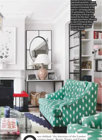  ??  ?? CLOCKWISE FROM LEFT Emma and Bunny embrace a festive look with House string lights, £25, Cox & Cox; the designers often use decorative prints – here, Sanderson’s Ooti 231268 cotton in Emerald, £76 per m – on large pieces of upholstery; The Rug Company...