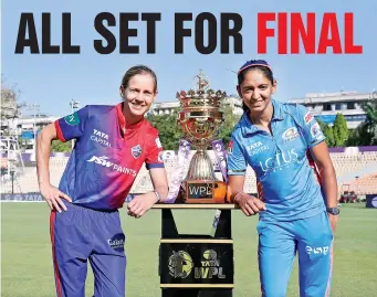 ?? ?? Rival captains Meg Lanning and Harmanpree­t Kaur pose with the trophy