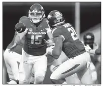  ?? NWA Democrat-Gazette/J.T. WAMPLER ?? Arkansas quarterbac­k Cole Kelley (15) has started the past four games, but Arkansas Coach Bret Bielema is not going to say whether Kelley or Austin Allen will start Saturday’s game at LSU.