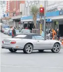  ?? Photos: KENT BLECHYNDEN/FAIRFAX NZ ?? spent an hour at the intersecti­on of Courtenay Place and Tory St yesterday. Almost every cycle of lights had a red-light runner.