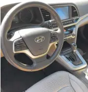  ??  ?? The interior of the 2018 Hyundai Elantra is handsome and functional.