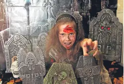  ?? Picture: Mhairi Edwards. ?? Amy Campbell, 10, gets into the spirit of things in the charity Halloween display.