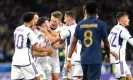  ?? Photograph: Adam Davy/PA ?? Billy Gilmour is swamped by Scotland teammates after scoring his first ever senior goal.