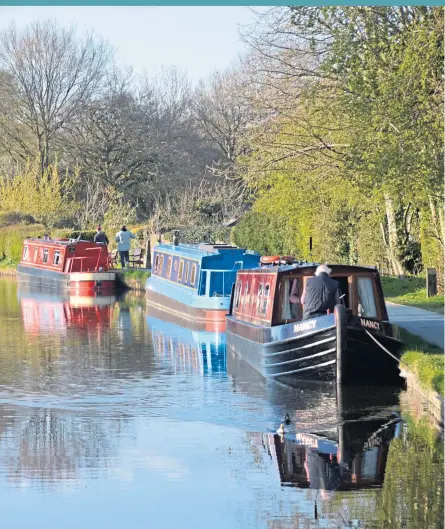  ??  ?? Clockwise from main: Boats moored along Llangollen Canal; Llangollen in Wales; Chirk Bank, Shropshire. Inset: Onboard a Black Prince Holidays boat