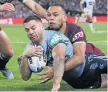  ?? Photo: Brett Costello ?? MATCHWINNE­R: James Tedesco scores a try.