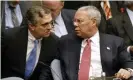  ?? Photograph: Mike Segar/Reuters ?? Colin Powell talks with George Tenet after his presentati­on to the UN security council in 2003.