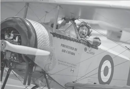  ?? PHOTOS:DAX MELMER ?? Larry Ricker prepares for a flypast in a Nieuport 11 replica biplane during Saturday’s exhibition at Windsor Internatio­nal Airport.