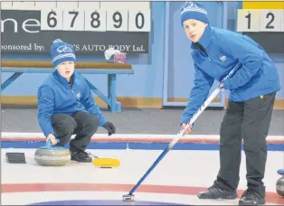  ?? NICHOLAS MERCER/SALTWIRE NETWORK/THE WESTERN STAR ?? Spencer (left) and Parker Tipple get some shots in during warm-ups for the second day of curling competitio­n at the Corner Brook Curling Club as a part of the 2018 NL Winter Games. The Tipple brothers, who are playing for Mount Pearl South at the...