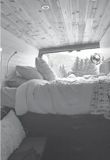  ?? PROVIDED BY ABBY ERLER ?? Abby and Cody Erler converted this Ram ProMaster van into use for life on the road during the pandemic, spending about $ 10,000 on upgrades, including a bed, electrical wiring, shelving and a stove. They are showcasing their story on Instagram @ roadtowild­erness.