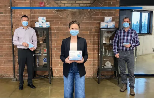  ?? Orpyx photo ?? Making masks and creating jobs: Bob Spence and Breanne Everett of Orpyx with Jeff Lister of Fidelity Medical Manufactur­ing (right).