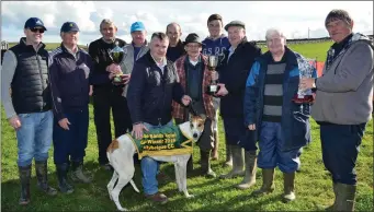  ??  ?? Jimmy Browne, Michael O’Neill, Pat McElligott, John Moynihan, M A Reidy, John Foley, Mike Foley and Ben Foley with the winning connection­s pictured after John’s dog, Souldern Street, won the White Sands Hotel Cup at Ballyheigu­e Coursing on Sunday. Photo by David O’Sullivan