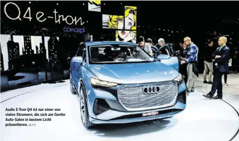  ?? GETTY ?? Audis E-Tron Q4 ist nur einer von vielen Stromern, die sich am Genfer Auto-Salon in bestem Licht präsentier­en.