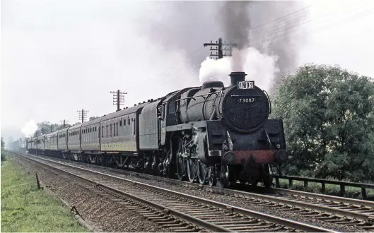  ?? T B Owen/Colour-Rail.com/380817 ?? S&D related inter-regionals were all given provision in the timings for assistance on the 1 in 37 Lickey incline. On loan from Nine Elms to Bath shed for the summer, BR Standard ‘5MT’ 4-6-0 No 73087 Linette is well into its stride at Vigo with 1M02, the 9.25am Bournemout­h (West) to Liverpool (Lime Street), after stopping to attach a banker at Bromsgrove on Saturday, 12 August 1961. This summer Saturday service was known in operationa­l circles as the relief ‘Pines’ as it ran 15 minutes ahead of the named express. Like the ‘Pines’ it avoided a Birmingham stop but ran to Liverpool after detaching through coaches for Manchester at Crewe. The reverse working departed from Manchester at 10.55am, 25 minutes after the ‘Pines’, and combined at Crewe with a portion from Liverpool that had set off at 10.30am.