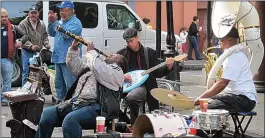  ??  ?? STRIKING THE RIGHT NOTE: A band on the streets of New Orleans