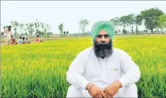  ?? RAVI KUMAR/HT ?? Gurmukh Singh in his field in Sirhind of Punjab. He feels the state government should announce full waiver of loans.
