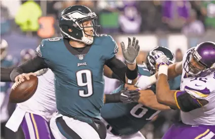  ?? BILL STREICHER/USA TODAY SPORTS ?? In the Eagles’ two playoff wins, Nick Foles averaged 9.49 yards per completion and a 77.8 completion percentage and had three TD passes and a 122.1 passer rating.