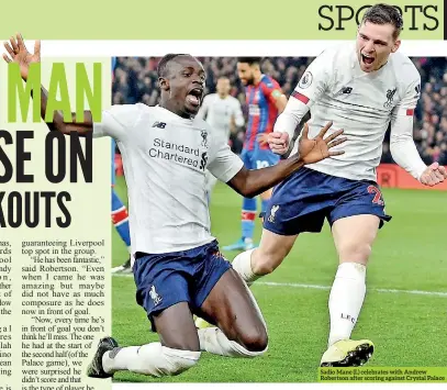  ??  ?? Sadio Mane (L) celebrates with Andrew Robertson after scoring against Crystal Palace