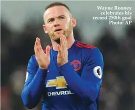  ??  ?? Wayne Rooney celebrates his record 250th goal Photo: AP