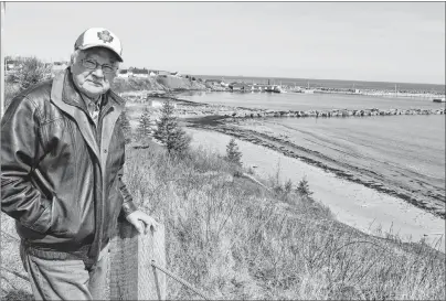  ?? SHARON MONTGOMERY-DUPE/CAPE BRETON POST ?? Port Morien Developmen­t Associatio­n secretary LeRoy Peach stands near the picnic area at Pensioners Point in Port Morien overlookin­g an area where the bank will be reconfigur­ed and stairs and a landing built for easy access to the beach below. Peach...