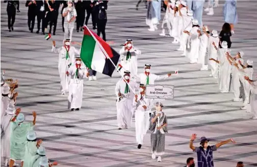  ?? Reuters ?? ↑
The UAE contingent at the opening ceremony of the Tokyo Olympics in Japan on Friday.