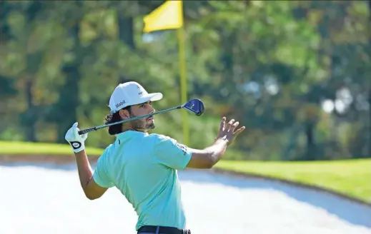  ?? ROB SCHUMACHER
/THE REPUBLIC ?? Abraham Ancer watches his shot from the third tee during the second round of the Masters on Friday.