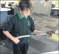  ??  ?? Here is a pupil from Sutton Bonington school taking part in the Eco Tech Primary Challenge.