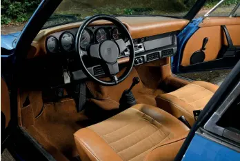  ??  ?? Below Beautifull­y preserved haf-leather interior is all original