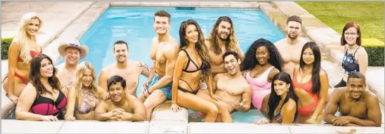  ?? Photograph­s by Monty Brinton CBS ?? HOUSEGUEST­S assemble in the pool for Season 21 of “Big Brother.” They’re competing in a house that’s been designed by Scott Storey with a camping theme.