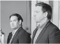  ?? SUSAN WALSH / AP ?? U.S. Sen. Marco Rubio, R-Fla., and Gov. Ron DeSantis listen as President Joe Biden meets with first responders in Miami Beach on July 1. Responders were working on the condo tower that collapsed in Surfside.