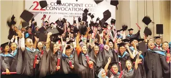  ??  ?? Some 386 Cosmopoint College Sabah and Sarawak graduates took their diplomas home yesterday.