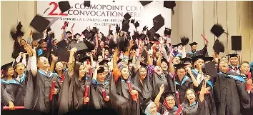  ??  ?? Some 386 Cosmopoint College Sabah and Sarawak graduates took their diplomas home yesterday.