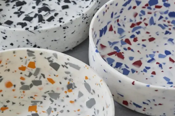  ??  ?? White clay bowls with electric blue, orange and red chips by Sevak Zargarian are £60 each at The Maker Place